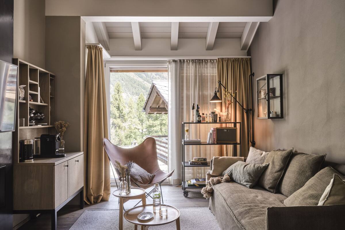 room (alpinist roof junior suite) | living area | tablet, ipod dock