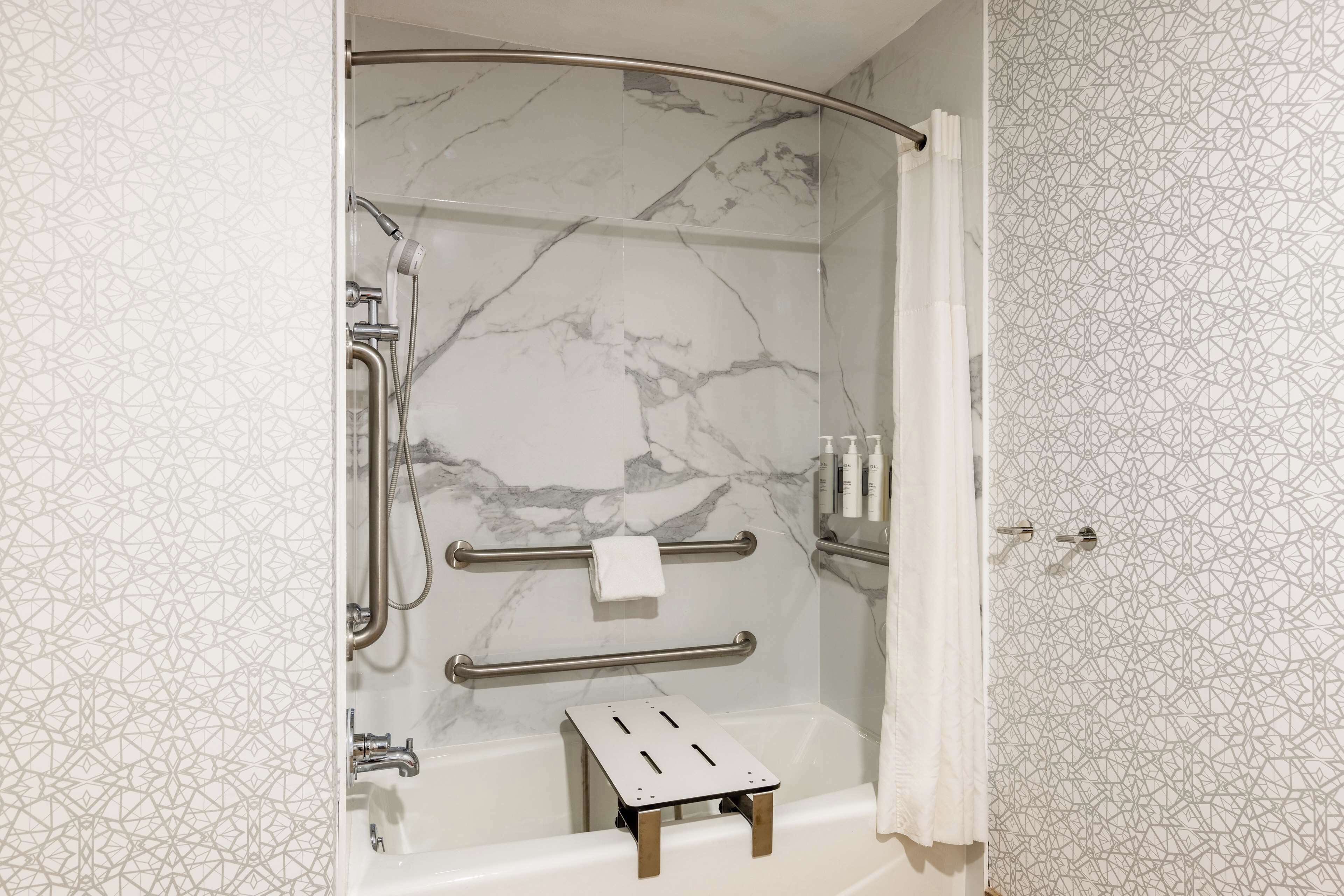 combined shower/bathtub, free toiletries, hair dryer, towels