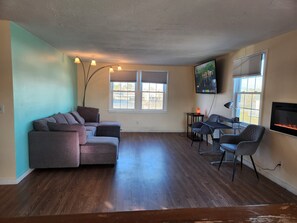 Deluxe Quadruple Room, 3 Bedrooms | Living area | 50-inch TV with digital channels - Jonathan Edwards Motel (Dennis Port)