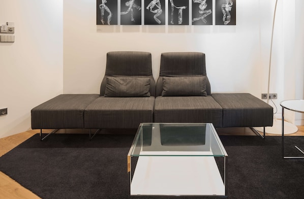 Suite ejecutiva | Ropa de cama de alta calidad y caja de seguridad en la habitación