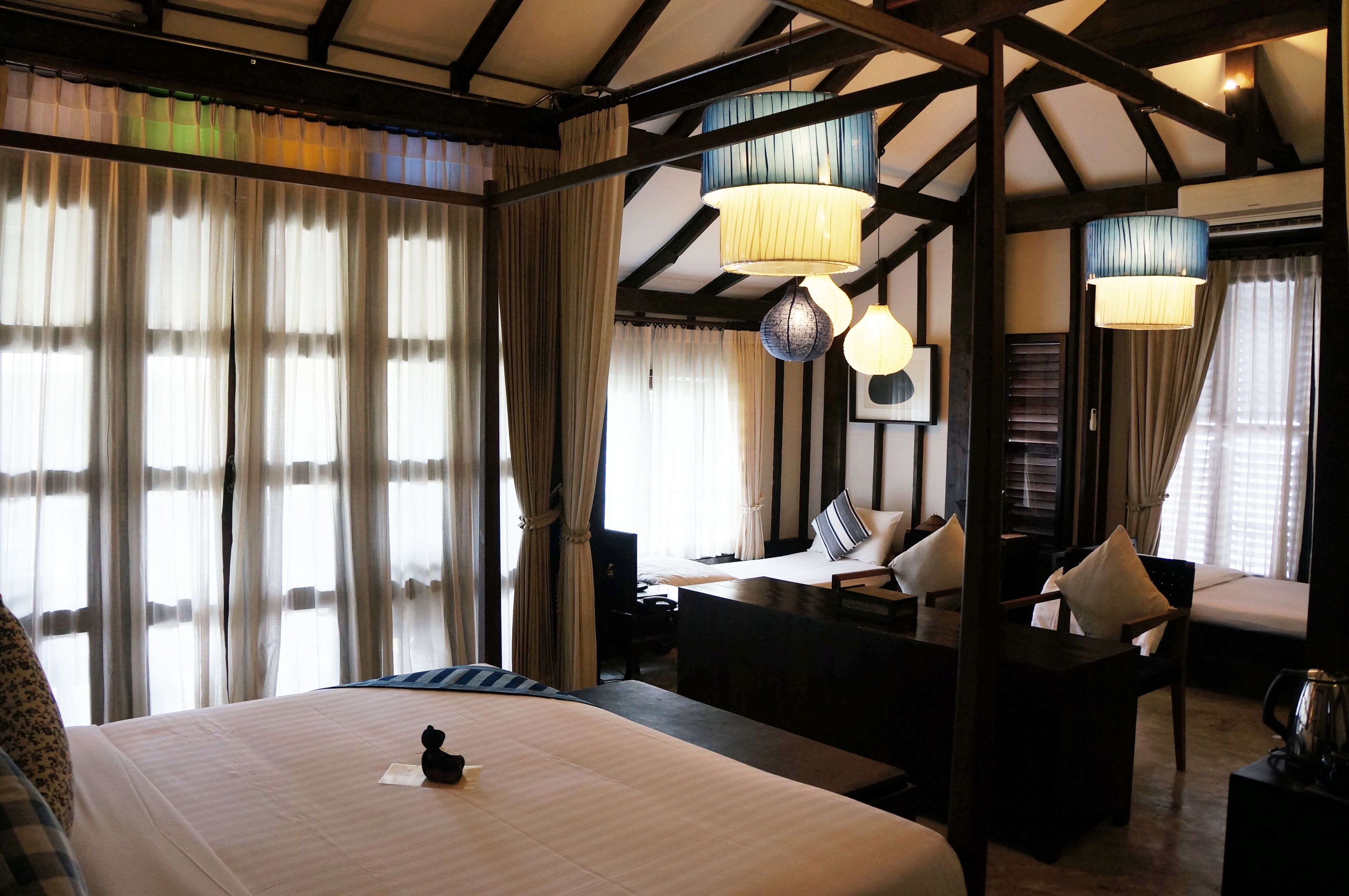 family triple room, multiple beds | premium bedding, minibar, in-room safe, desk