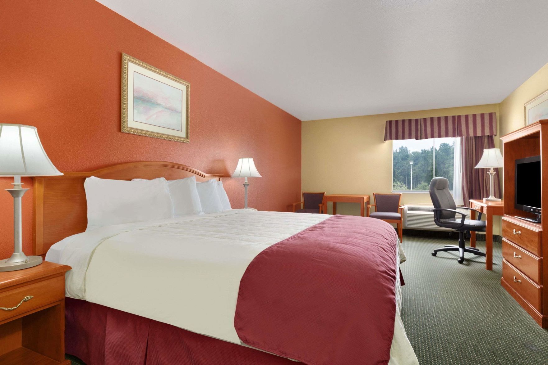 Desk, blackout drapes, iron/ironing board, rollaway beds