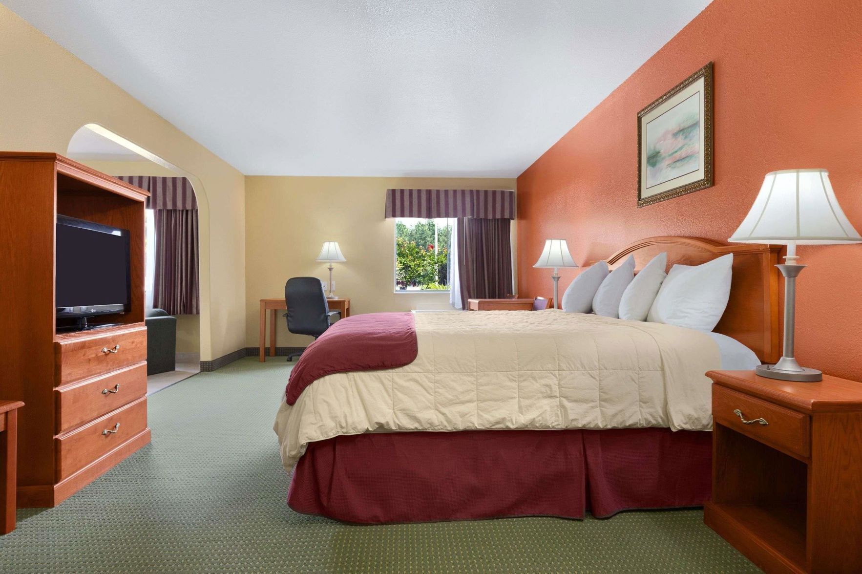 Desk, blackout drapes, iron/ironing board, rollaway beds