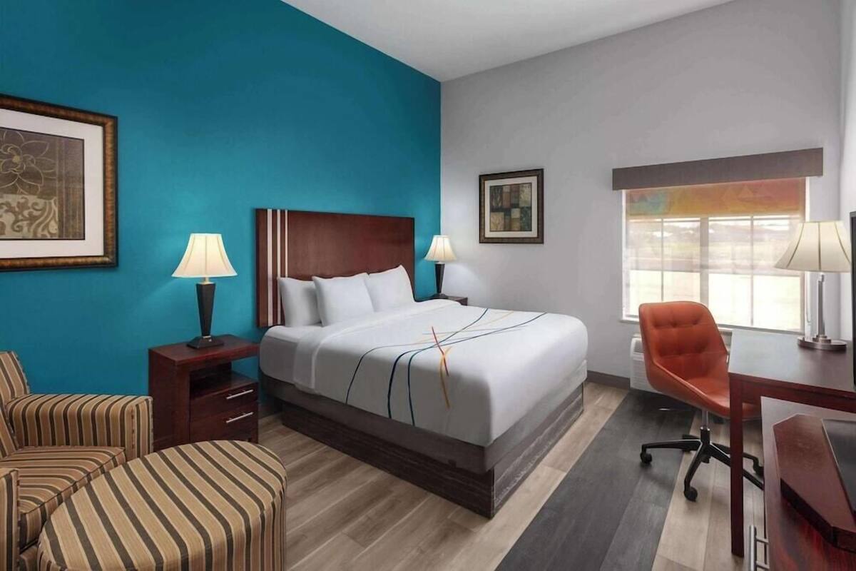Premium bedding, desk, blackout curtains, iron/ironing board