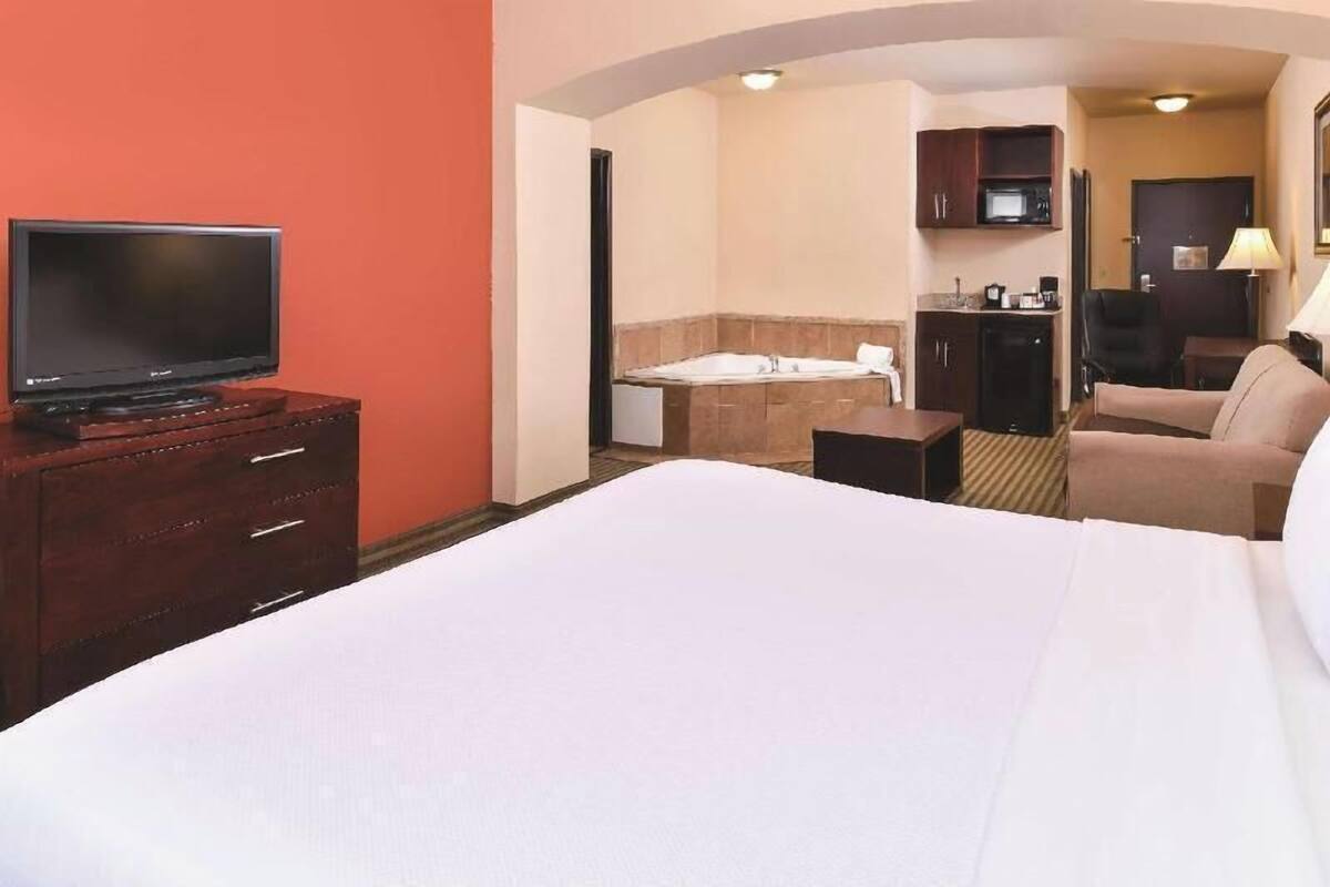 Premium bedding, desk, blackout curtains, iron/ironing board