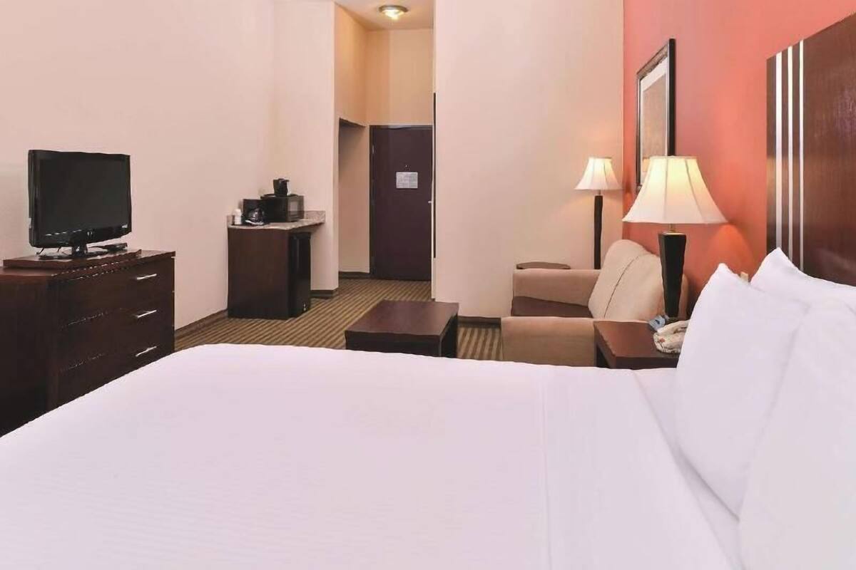 Premium bedding, desk, blackout curtains, iron/ironing board