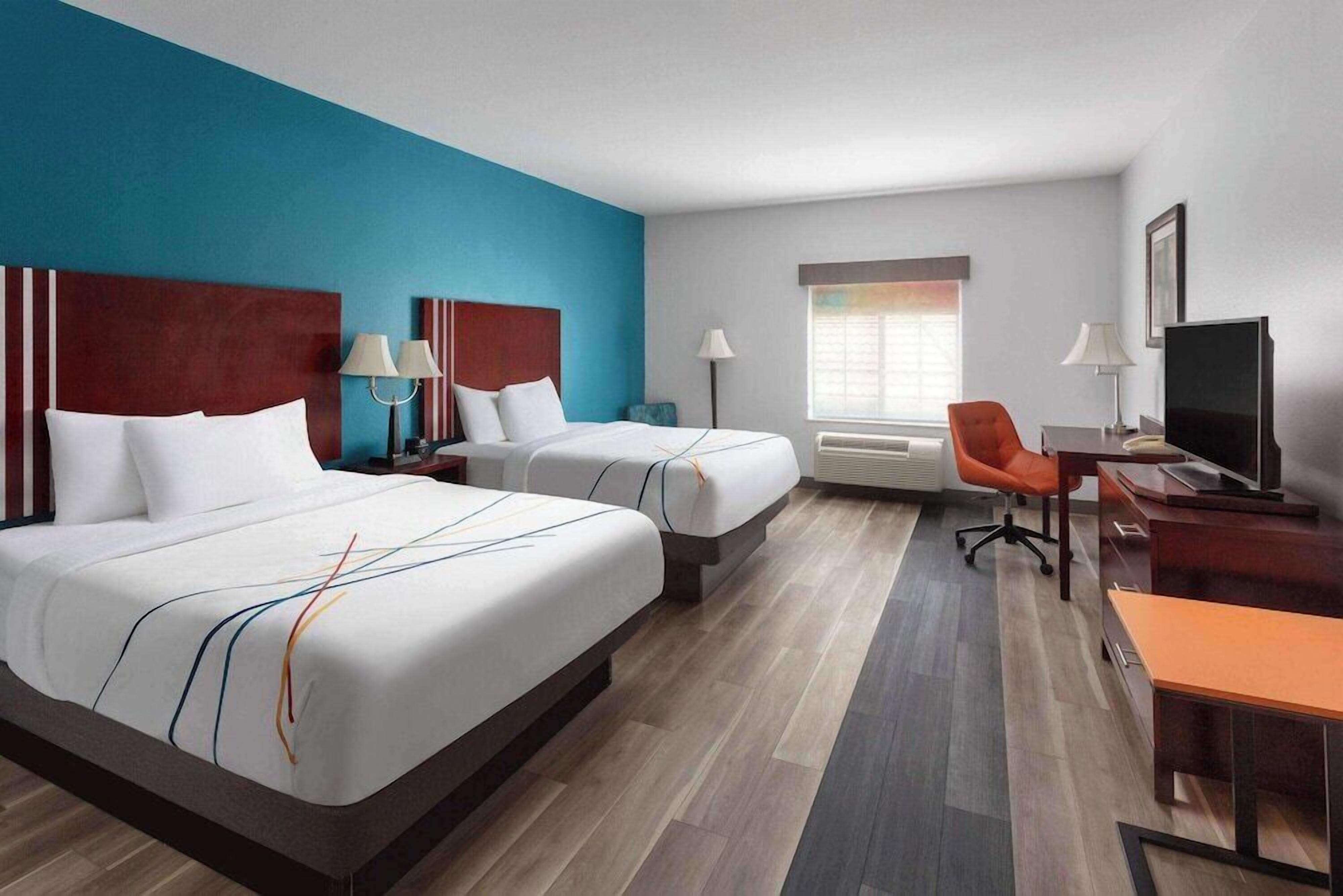 Premium bedding, desk, blackout curtains, iron/ironing board