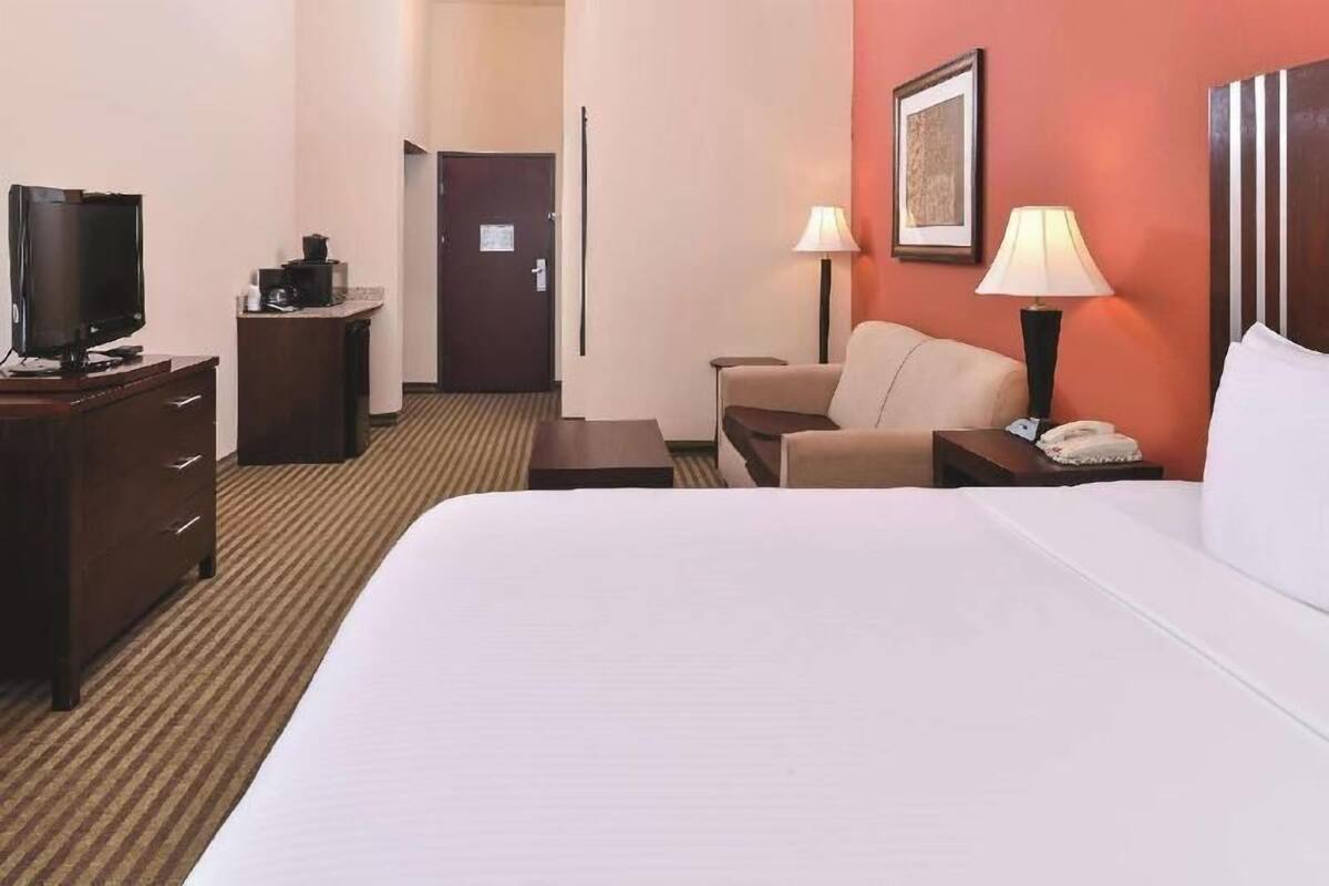 Premium bedding, desk, blackout curtains, iron/ironing board