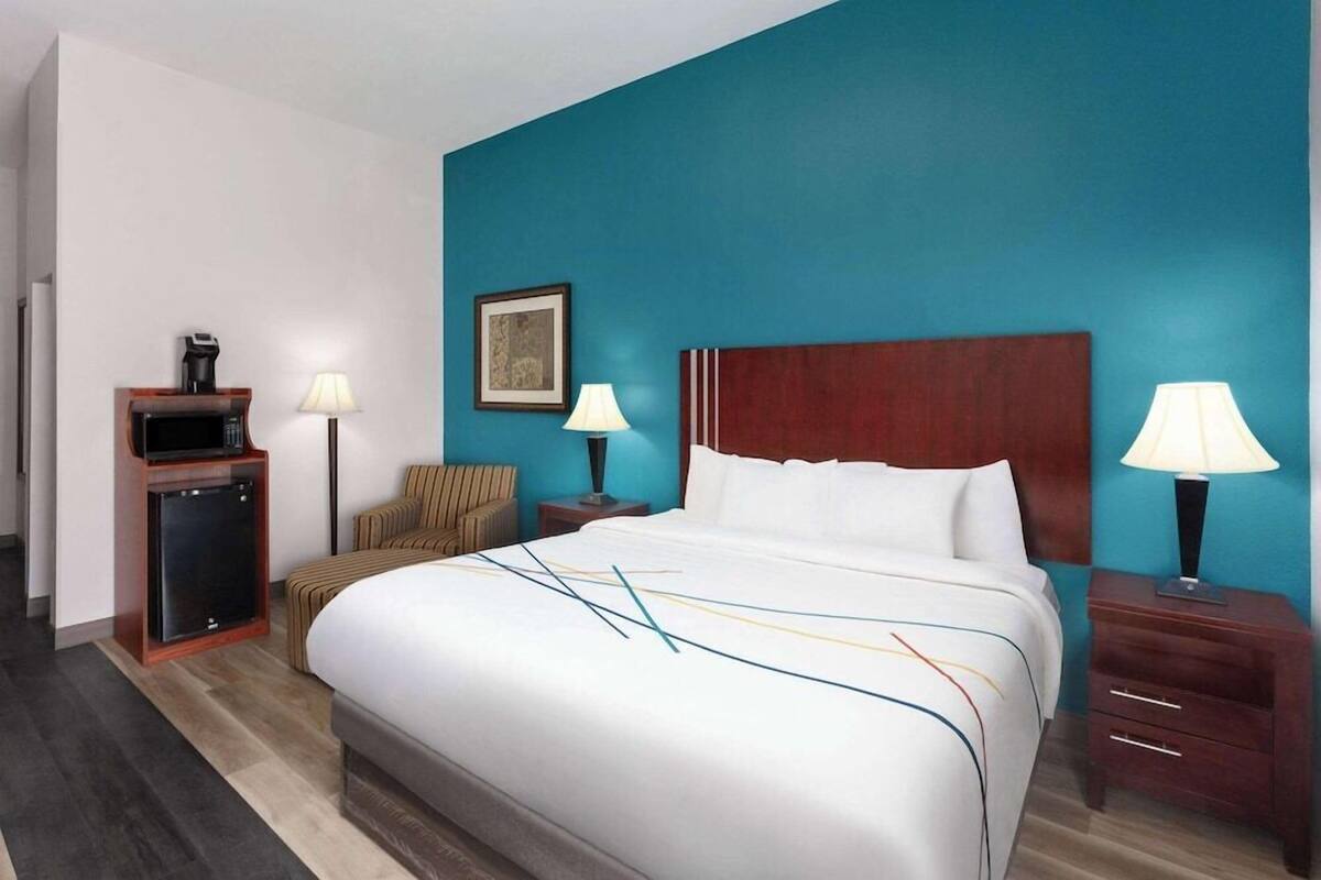 Premium bedding, desk, blackout curtains, iron/ironing board