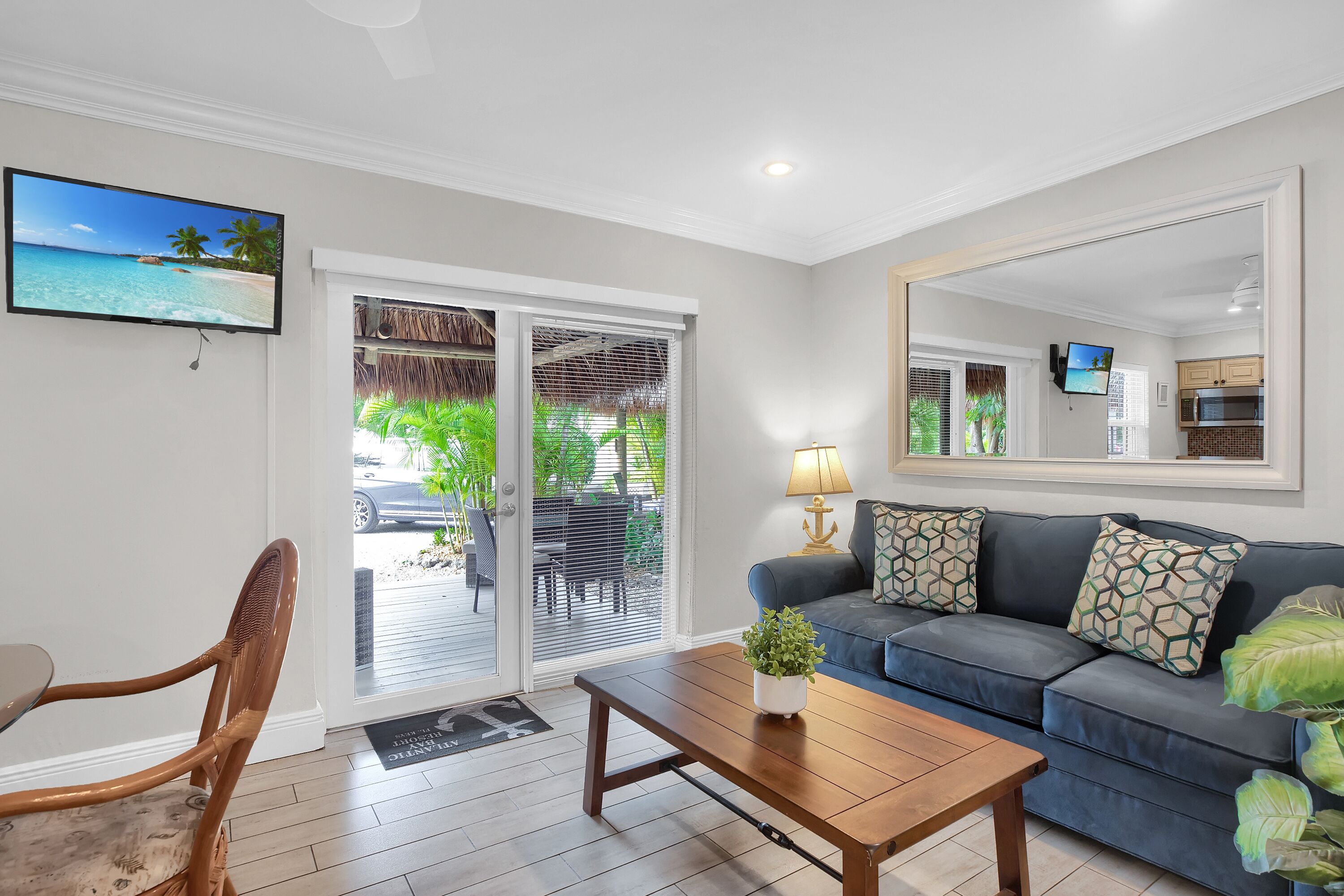 cottage, kitchen (with tiki hut porch) | living area | flat-screen tv