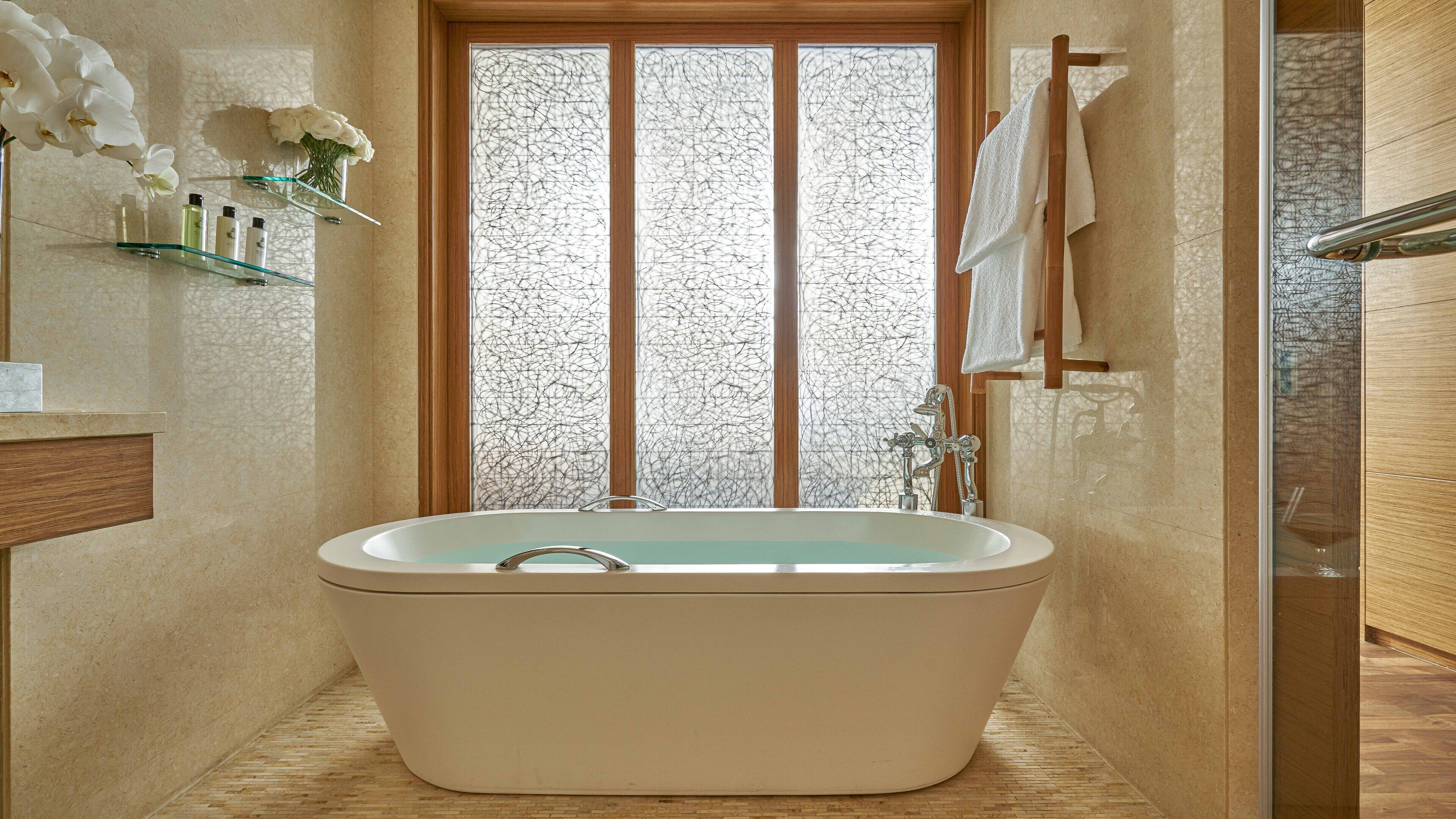 separate bathtub and shower, rainfall showerhead, free toiletries