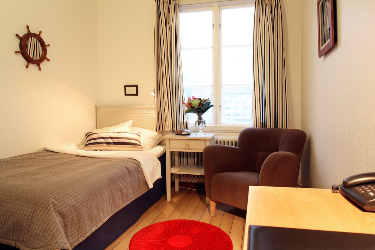 Desk, blackout curtains, iron/ironing board (on request), free WiFi