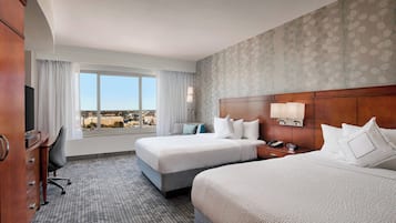 Hypo-allergenic bedding, pillow-top beds, in-room safe, desk
