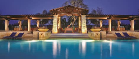 4 outdoor pools, cabanas (surcharge), pool umbrellas