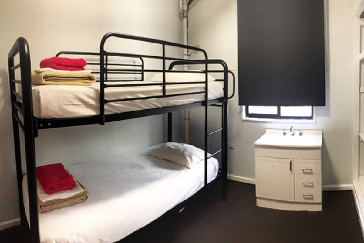 Twin Room, Shared Bathroom | Laptop workspace, blackout drapes, iron/ironing board, free WiFi