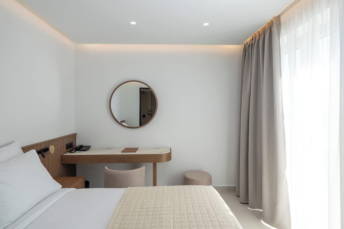 Estudi en suite júnior | 1 dormitori, roba de llit d'alta qualitat i caixa forta a l'habitació