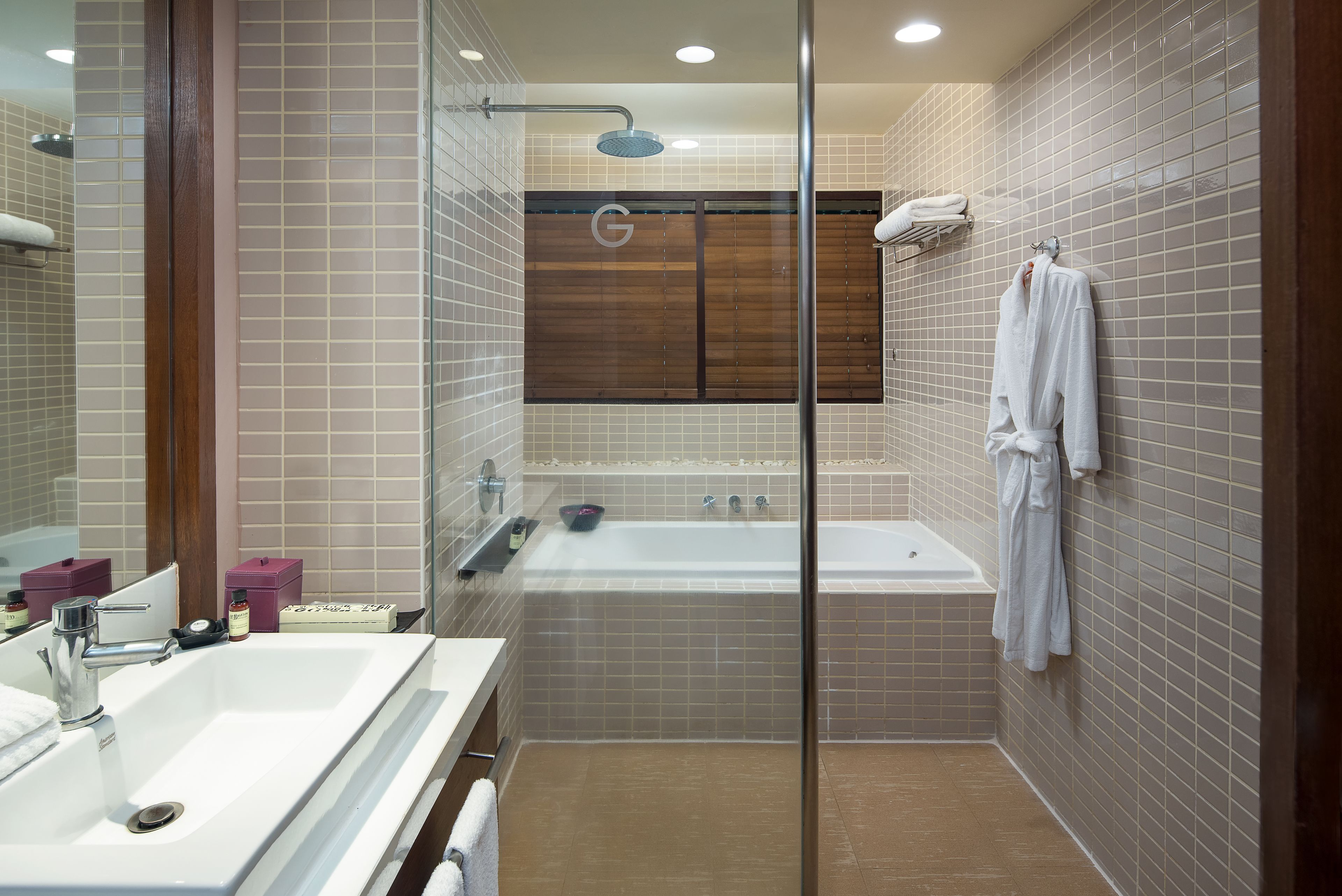 bathtub, eco-friendly toiletries, hair dryer, bathrobes