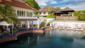 2 outdoor pools, open 6:00 AM to 7:00 PM, pool cabanas (surcharge)