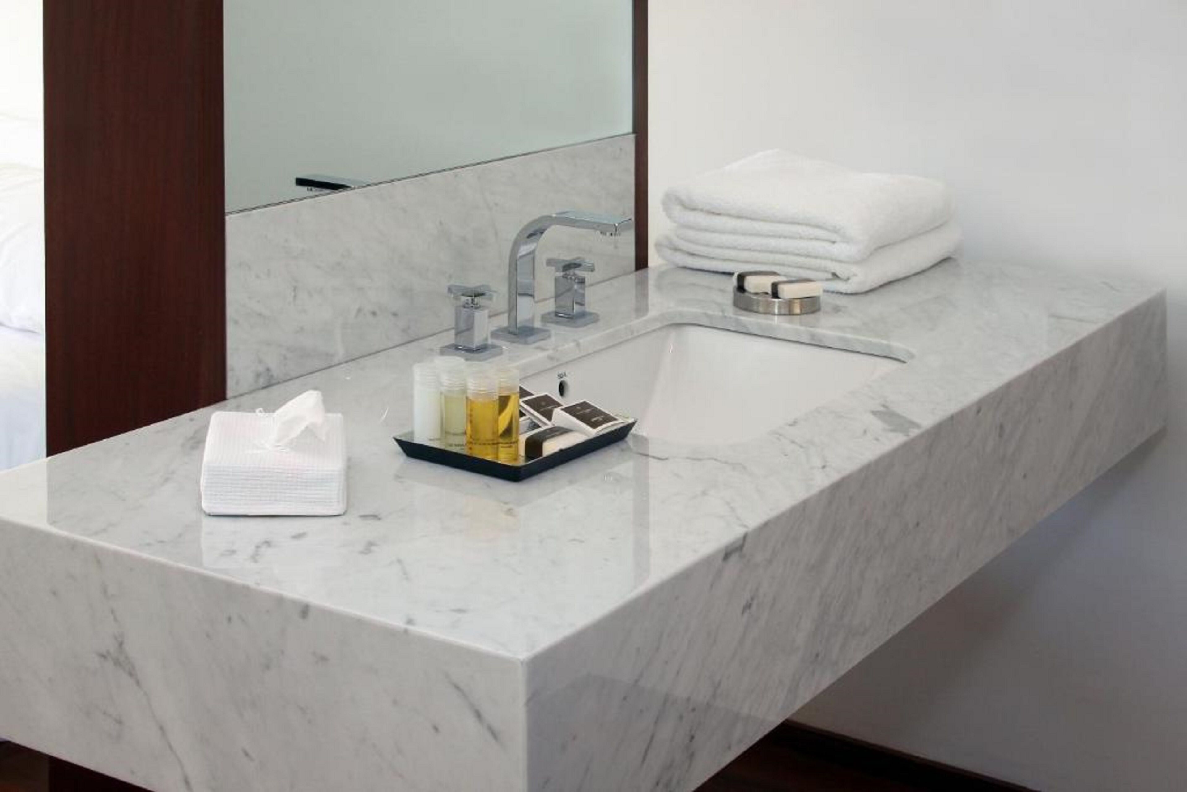 classic double or twin room, 1 double or 2 single beds, pool view | bathroom | combined shower/bathtub, rainfall showerhead, free toiletries