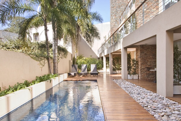 Outdoor pool, pool umbrellas, pool loungers