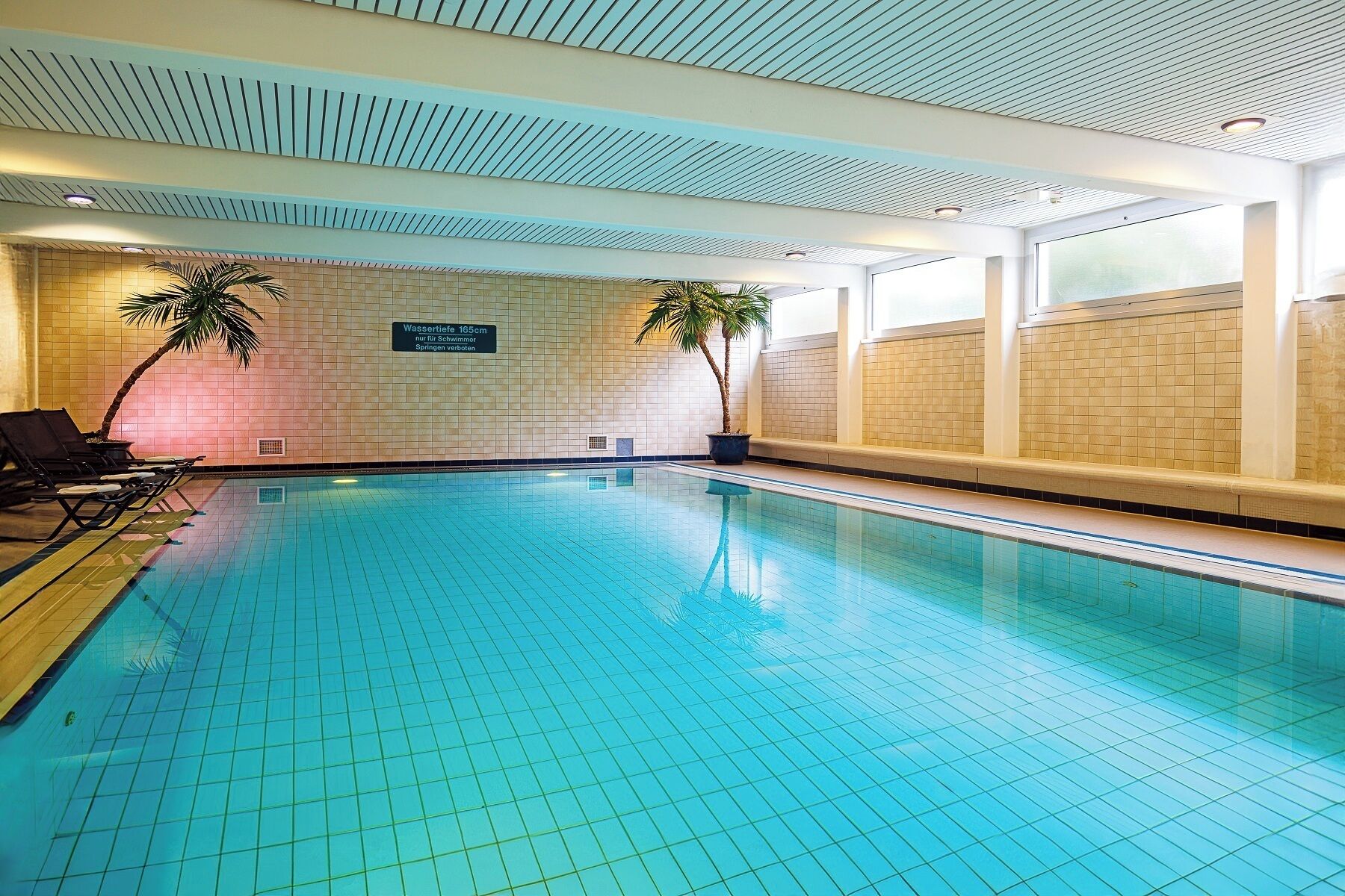 indoor pool, open 6:00 am to 10:00 pm, pool loungers