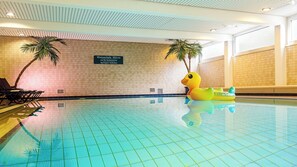 Indoor pool, open 6:00 AM to 10:00 PM, pool loungers