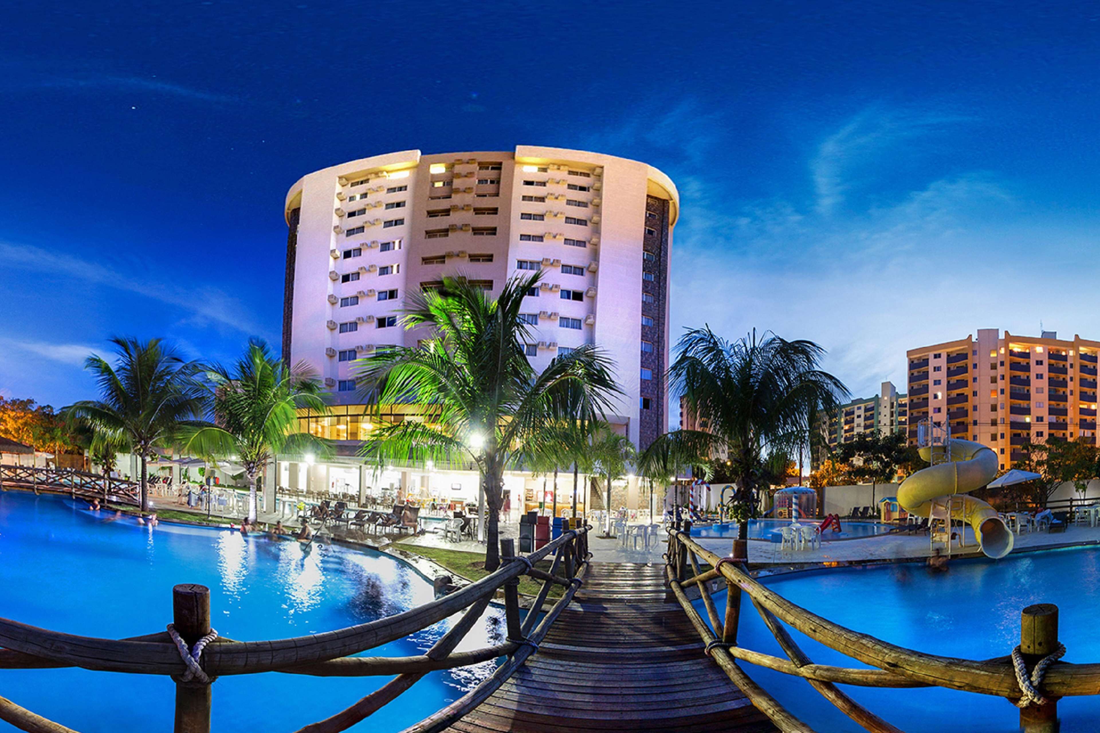 4 outdoor pools, open 6:00 AM to 11:00 PM, pool umbrellas, sun loungers
