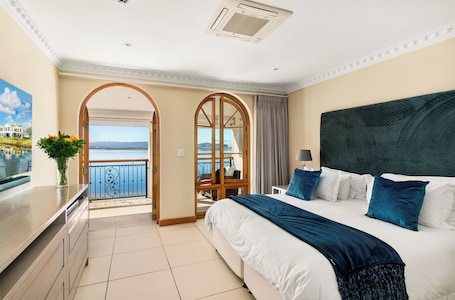 Executive Penthouse, 1 King Bed, Lagoon View | Hypo-allergenic bedding, minibar, in-room safe, individually decorated. St James of Knysna