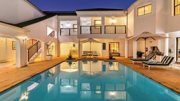 2 outdoor pools, pool umbrellas, pool loungers