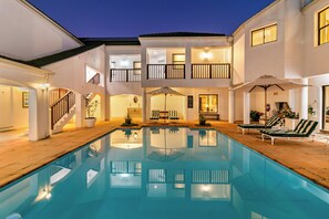 2 outdoor pools, pool umbrellas, pool loungers