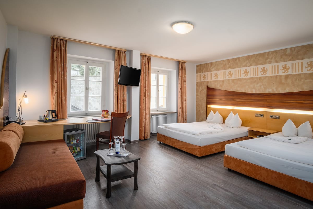 Luxury Double Room | Living area | Flat-screen TV