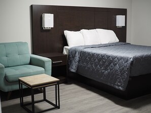 Quarto clássico, 1 cama Queen | Escrivaninha, Wi-Fi de cortesia, roupa de cama