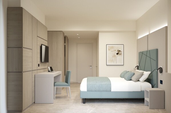 A modern bedroom with a bed, desk, chair, and artwork. - Hotel Residence Holiday (Sirmione)