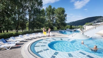 Indoor pool, outdoor pool, open 9 AM to 9 PM, pool umbrellas