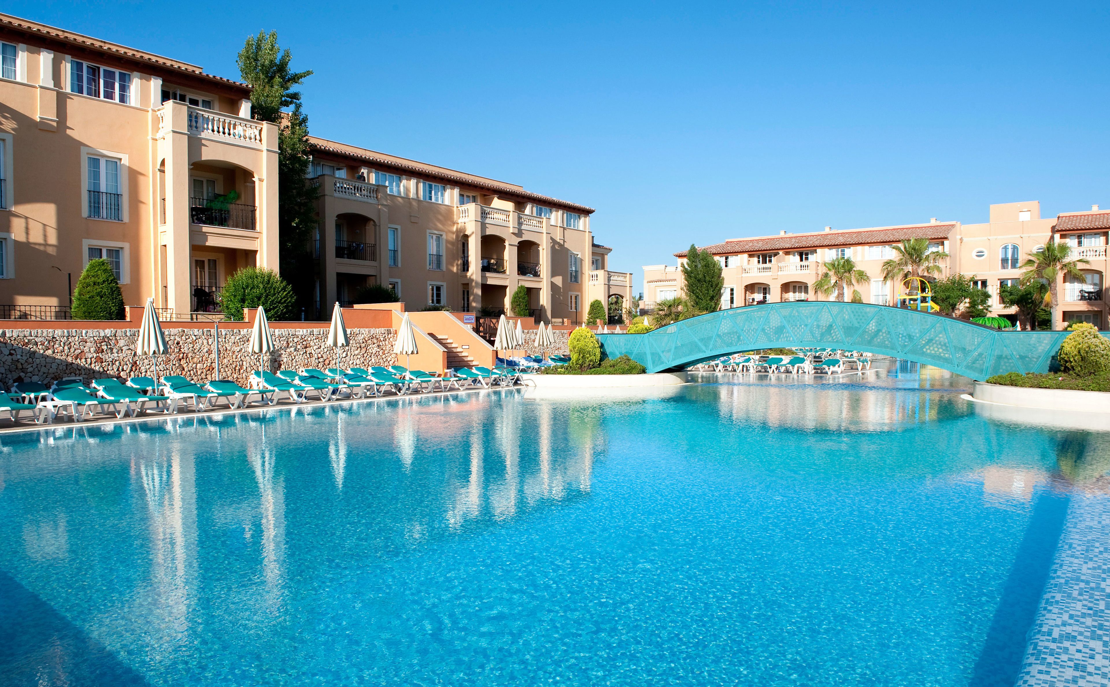 outdoor pool, pool umbrellas, pool loungers