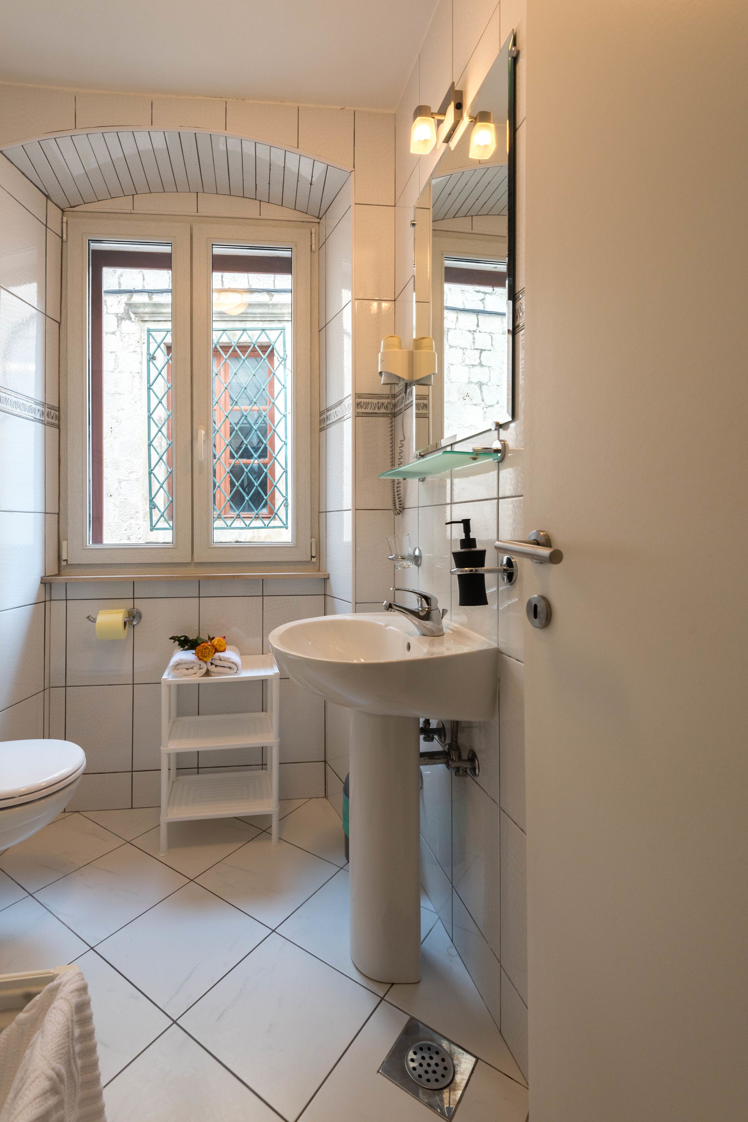 shower, free toiletries, hair dryer, slippers