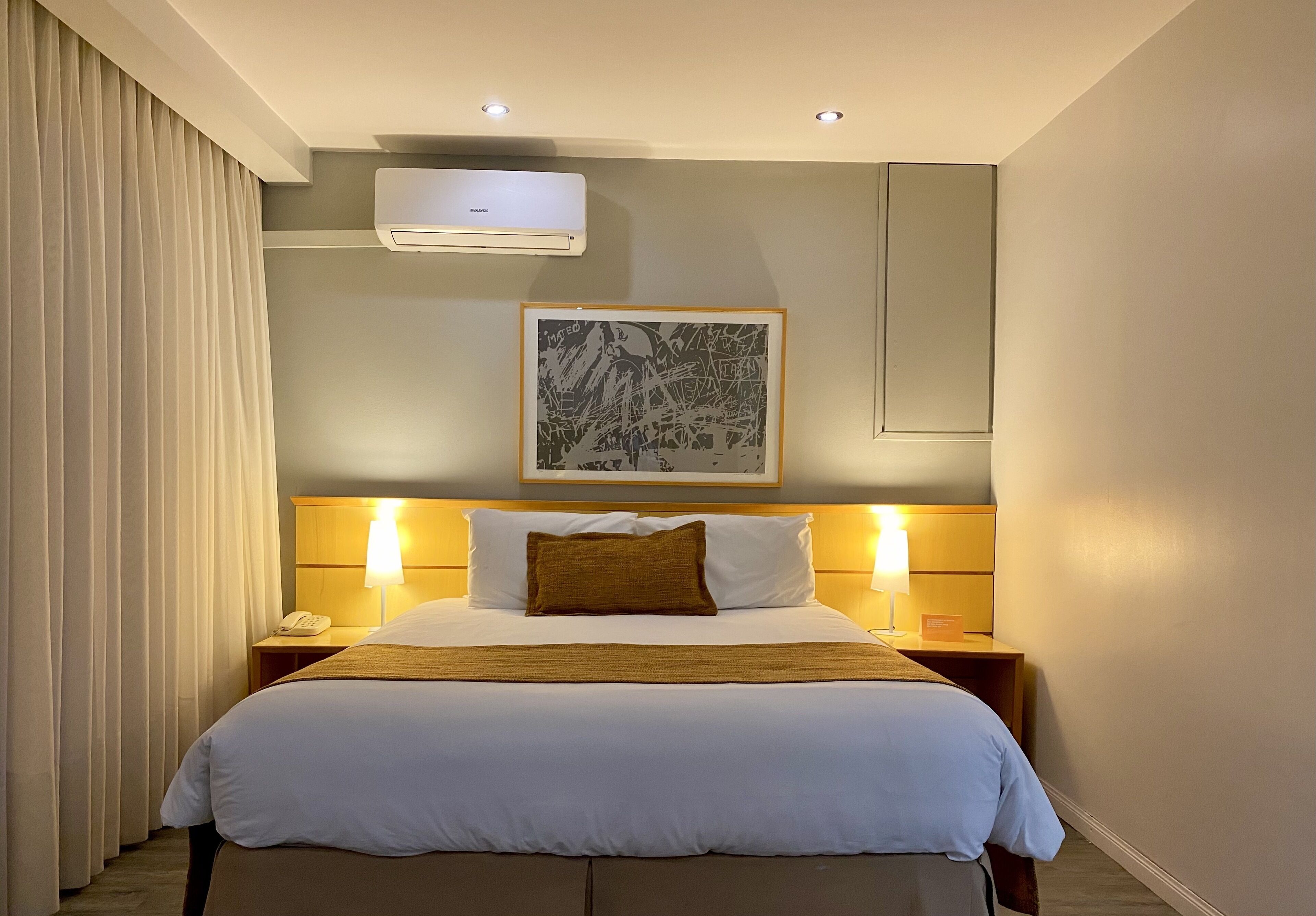 superior penthouse, 1 queen bed, non smoking, city view | 1 bedroom, in-room safe, blackout curtains, iron/ironing board