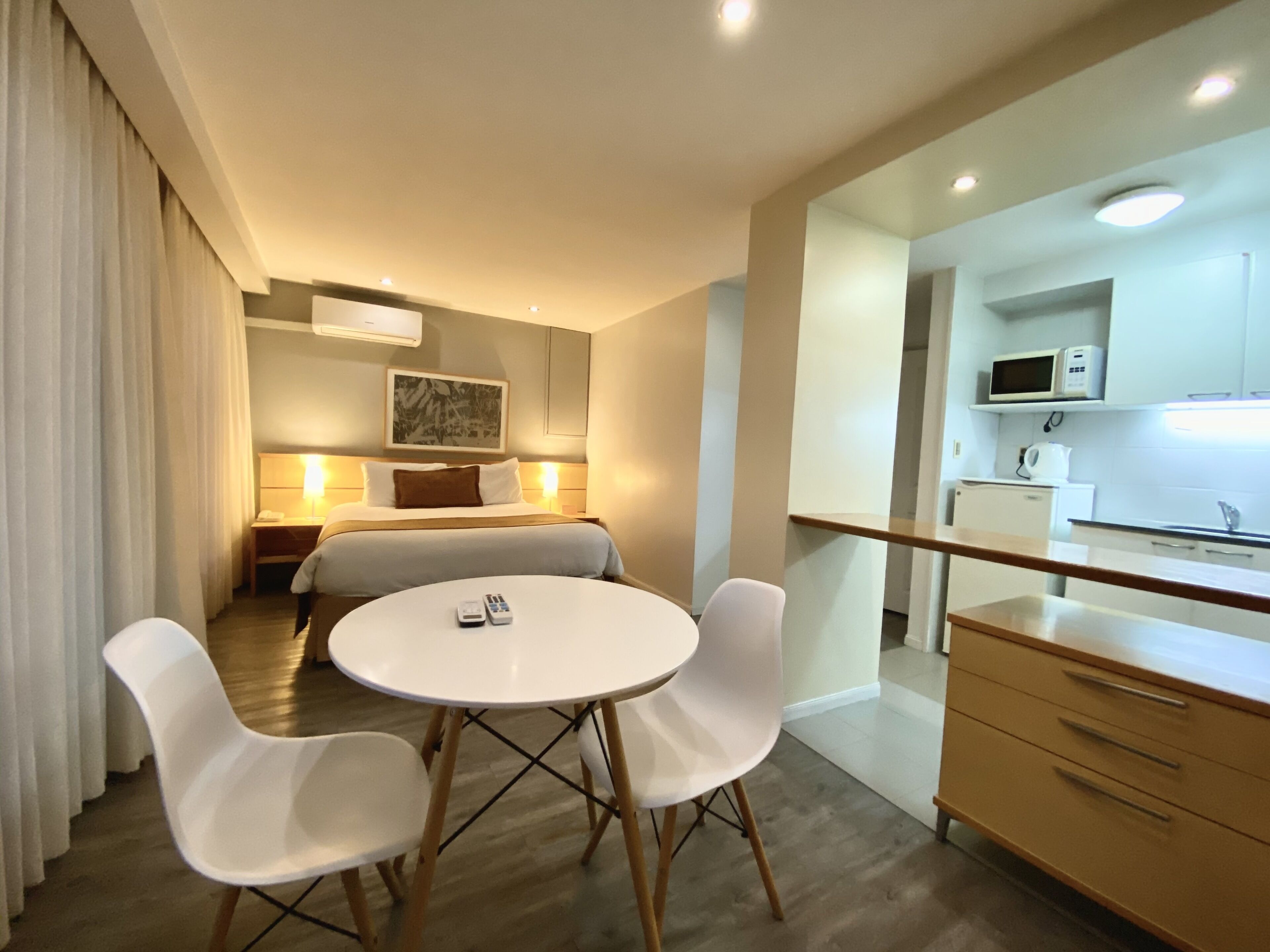 superior penthouse, 1 queen bed, non smoking, city view | 1 bedroom, in-room safe, blackout curtains, iron/ironing board