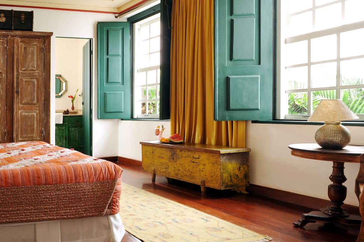 deluxe room | premium bedding, minibar, in-room safe, individually decorated