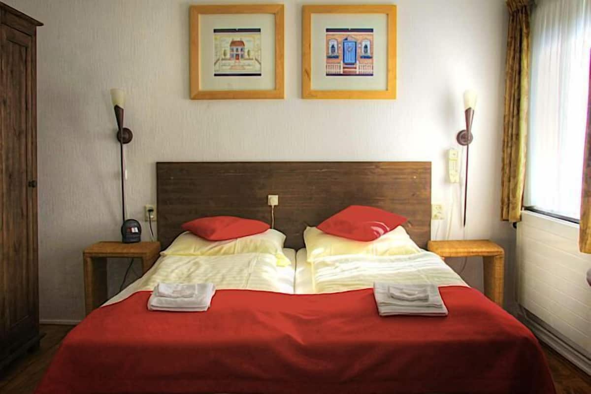 Wi-Fi de cortesia, roupa de cama