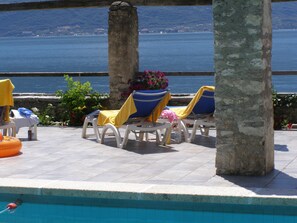 Seasonal outdoor pool, pool umbrellas, sun loungers