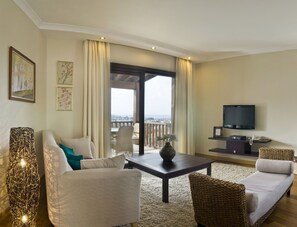 Executive Deluxe Suite with Hot Tub, Terrace & Sea View | Living room | 40-inch LED TV with satellite channels, TV, Netflix
