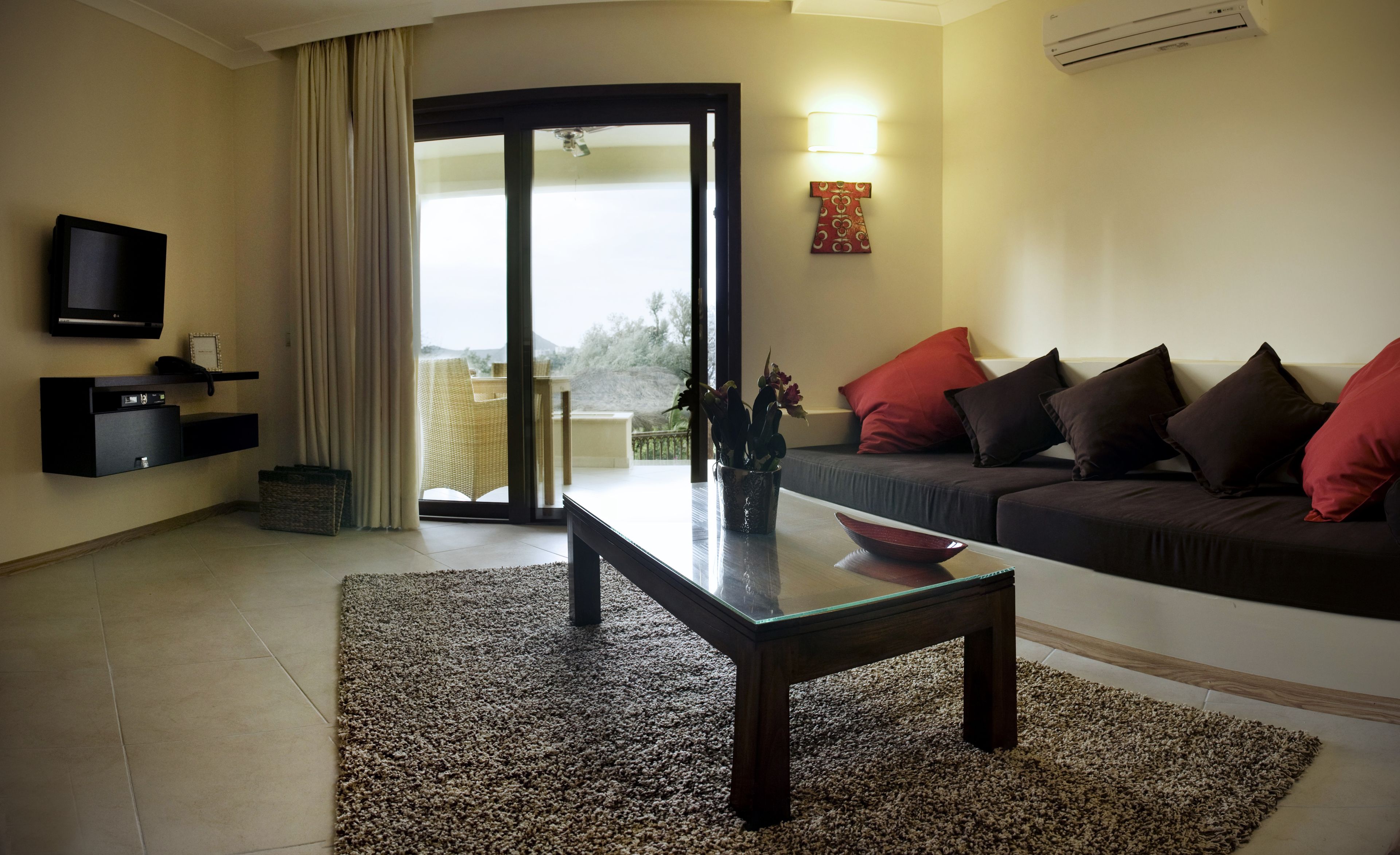 superior suite with balcony & sea view | living area | 40-inch led tv with satellite channels, tv, netflix