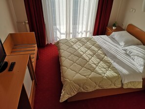 Colchones con pillow-top, minibar y caja de seguridad en la habitación 