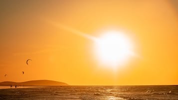 On the beach, white sand, kayaking, motor boating