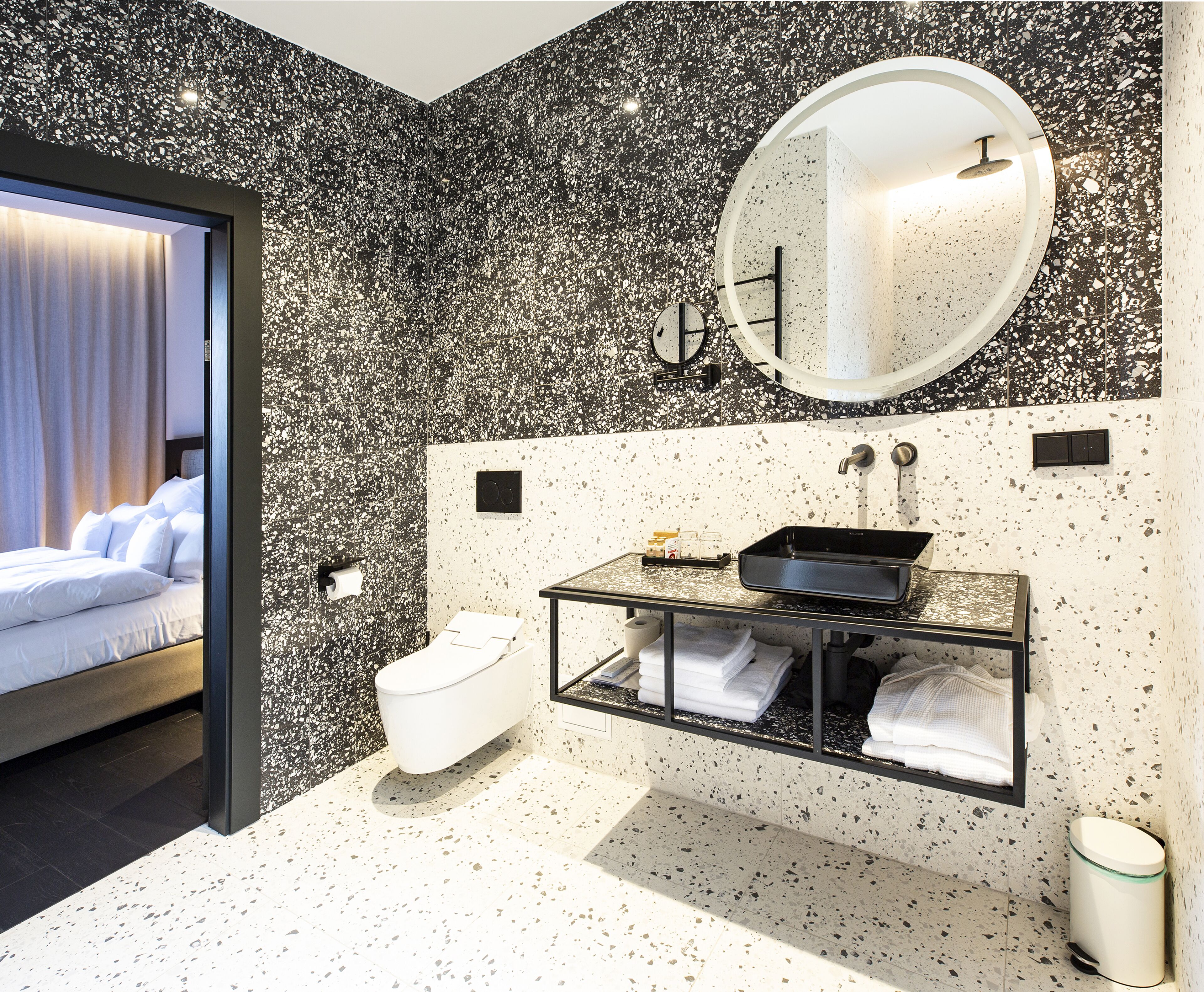 deluxe suite | bathroom | free toiletries, hair dryer, slippers, towels