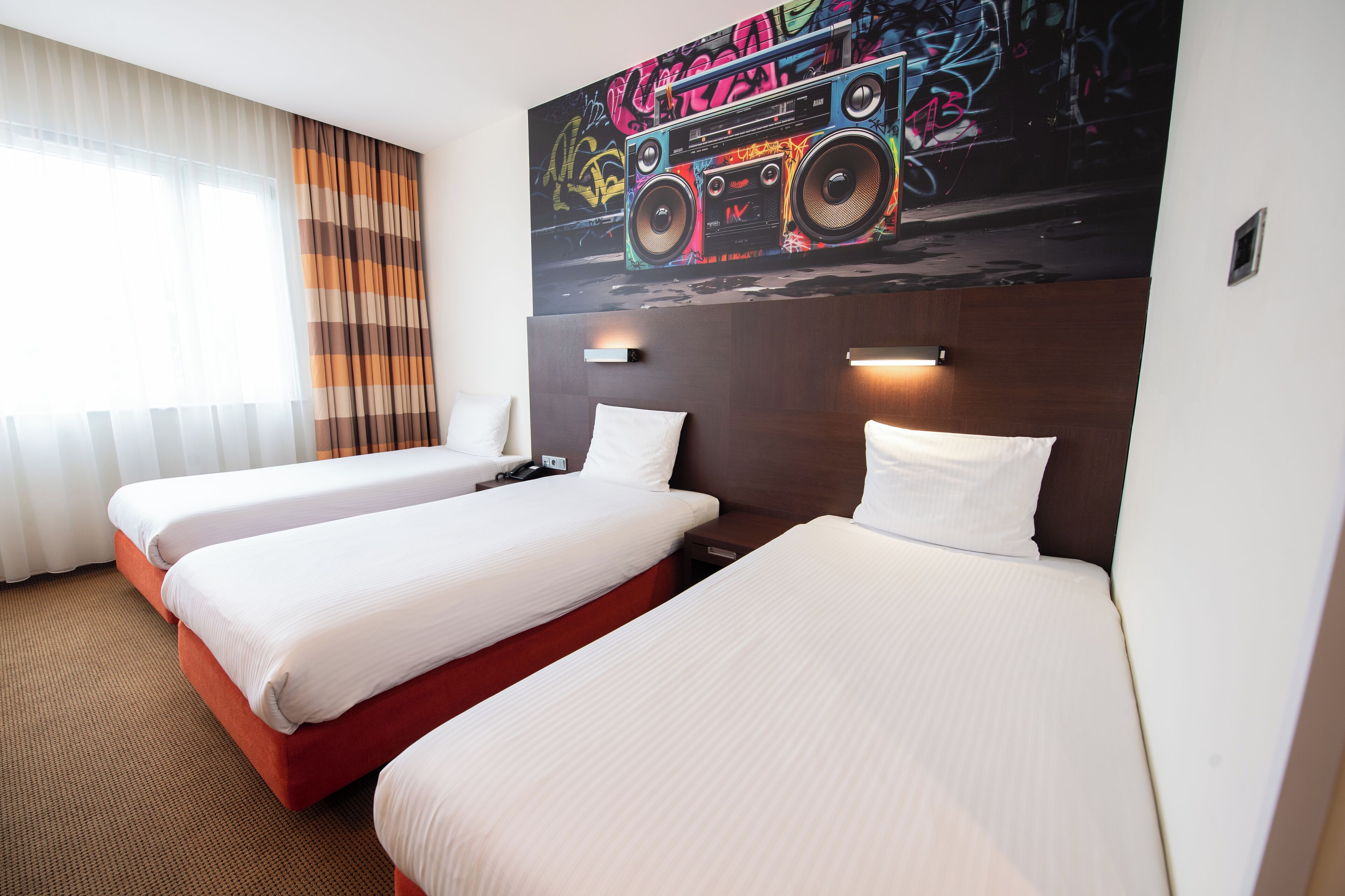 triple room, 3 single beds | hypo-allergenic bedding, in-room safe, desk, blackout curtains