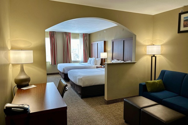 Suite, Multiple Beds, Non Smoking | Pillowtop beds, desk, soundproofing, iron/ironing board