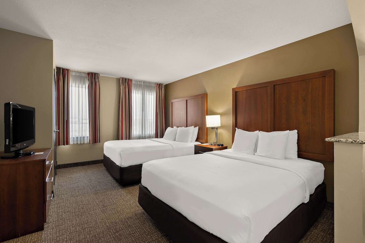 Suite, Multiple Beds, Non Smoking | Pillowtop beds, desk, soundproofing, iron/ironing board
