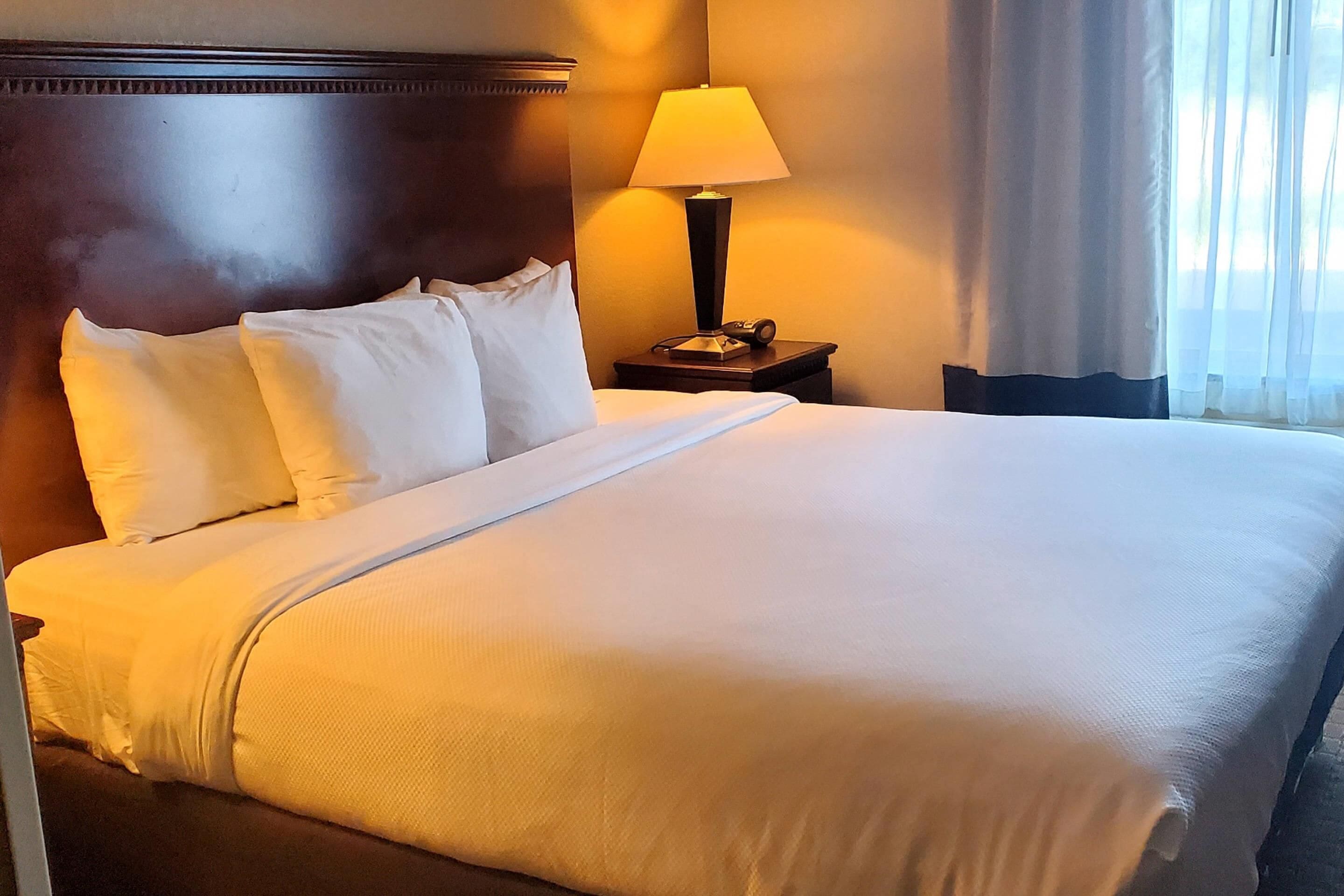 Pillow-top beds, desk, laptop workspace, blackout curtains